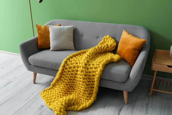 Grey Sofa Cushions Yellow Plaid Green Wall — Stock Photo, Image