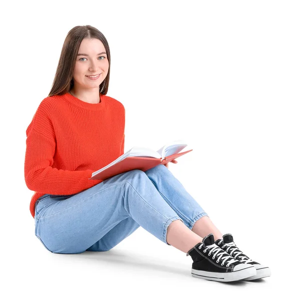 Νεαρή Γυναίκα Κόκκινο Πουλόβερ Βιβλίο Κάθεται Λευκό Φόντο — Φωτογραφία Αρχείου