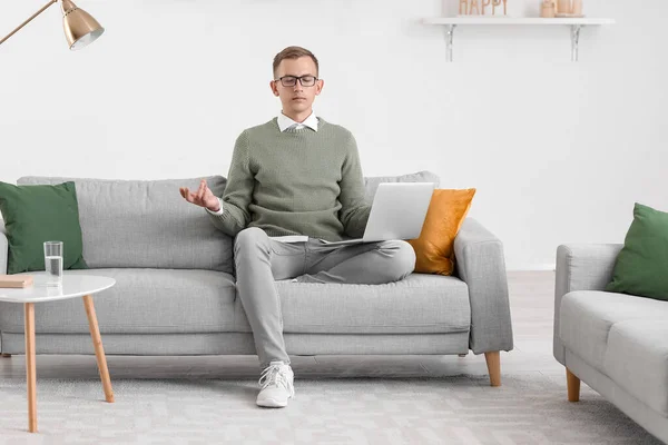 Young Man Laptop Meditating Sofa Home — Stock Photo, Image
