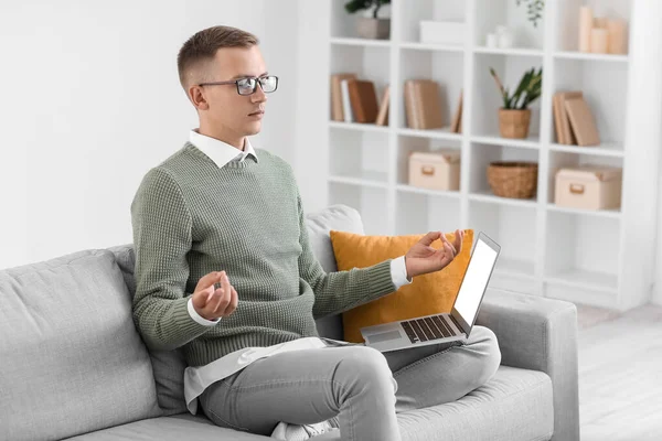 Young Man Laptop Meditating Sofa Home — Stock Photo, Image