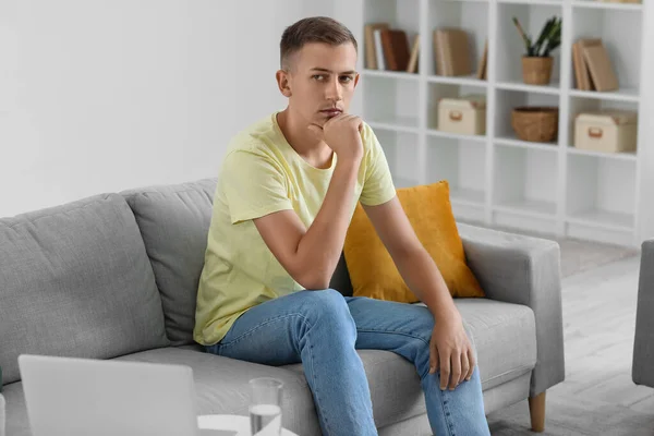 Thoughtful Young Man Sitting Sofa Home — Stock Photo, Image