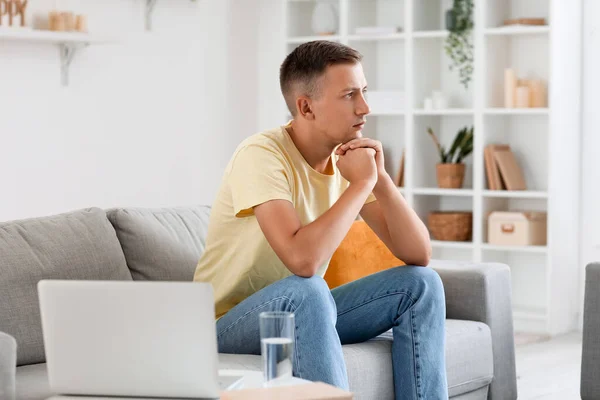 Thoughtful Young Man Sitting Sofa Home — Stock Photo, Image