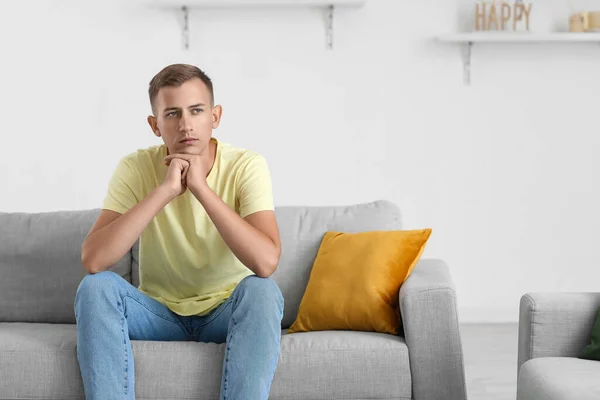 Thoughtful Young Man Sitting Sofa Home — Stock Photo, Image