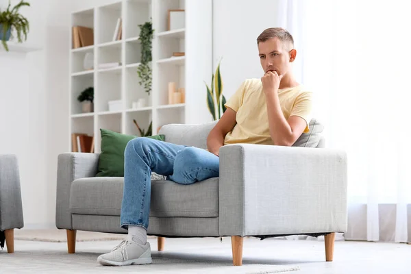 Thoughtful Young Man Sitting Sofa Home — Stock Photo, Image