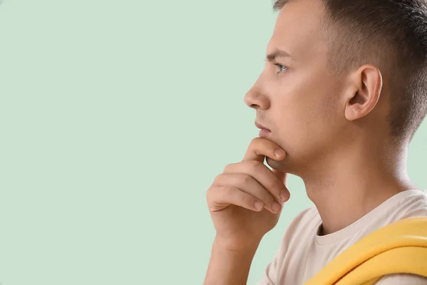 Thoughtful Young Man Green Background Closeup — Stock Photo, Image
