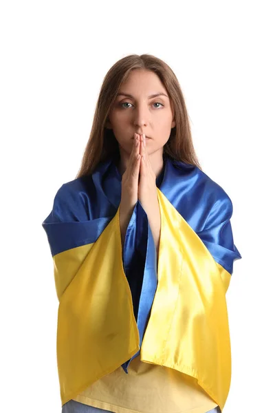 Молодая Женщина Украинским Флагом Молится Белом Фоне — стоковое фото