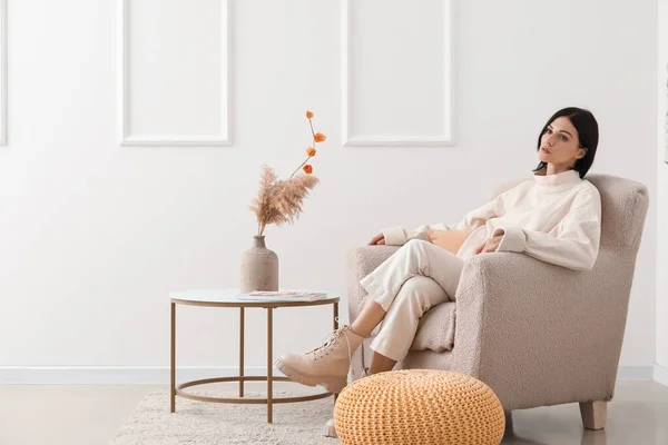 Young Woman Sitting Beige Armchair Home — Stock Photo, Image