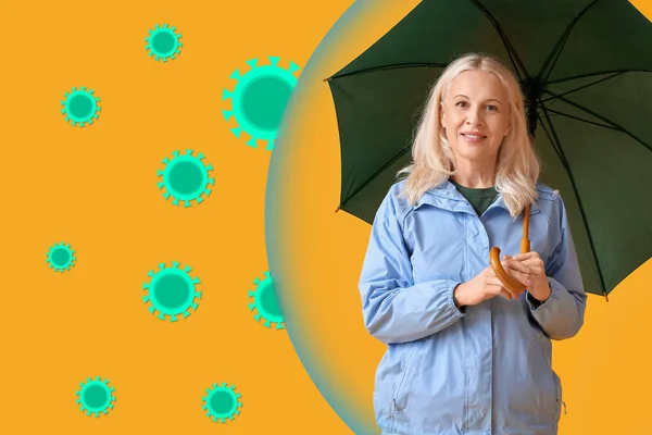 Mature Woman Umbrella Yellow Background Concept Strong Immunity — Stock Photo, Image