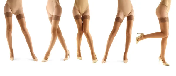 Nombreuses Jambes Belles Jeunes Femmes Bas Beige Isolés Sur Blanc — Photo