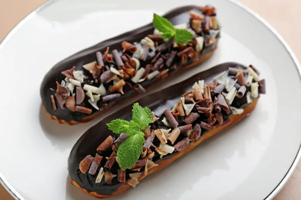 Plate Sweet Chocolate Eclairs Closeup — Stock Photo, Image