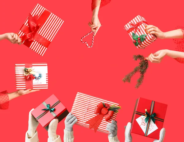 Many Hands Christmas Gift Boxes Candy Canes Fir Branch Red — Stock Photo, Image