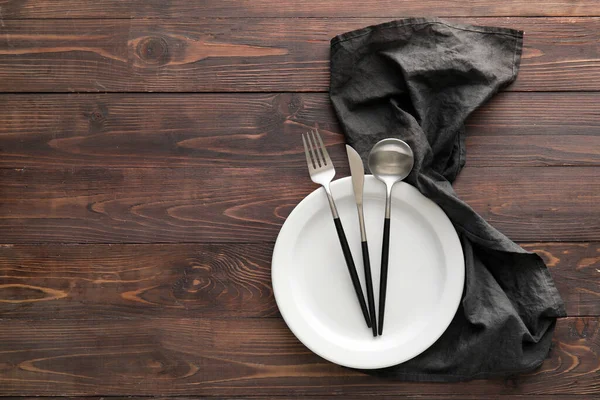 Table Setting Cutlery Plate Black Napkin Wooden Background — Stock Photo, Image