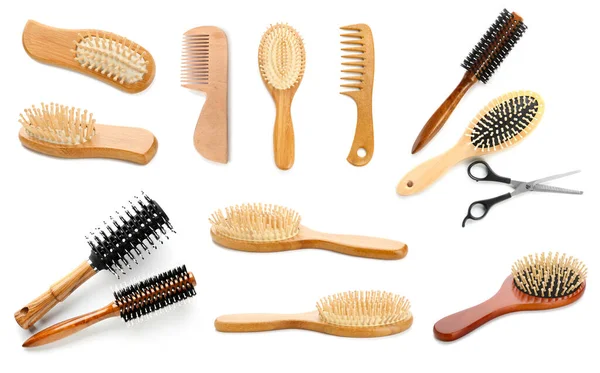 Set of different hair brushes and combs isolated on white
