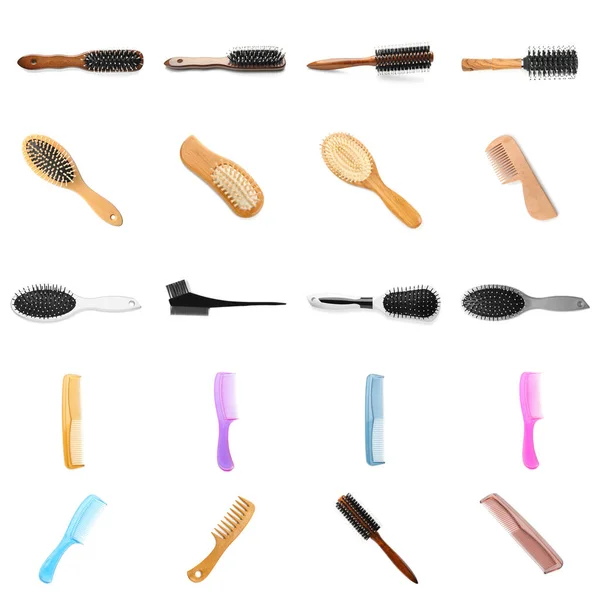 Set of different hair brushes and combs isolated on white