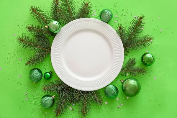 Composition Plate Fir Branches Christmas Decorations Green Background — Stock Photo, Image