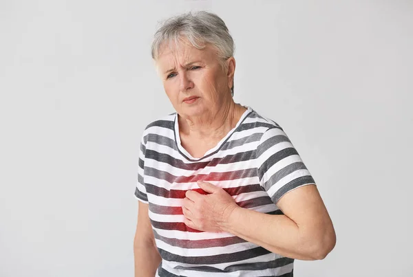 Senior Woman Having Heart Attack Grey Background — Stock Photo, Image