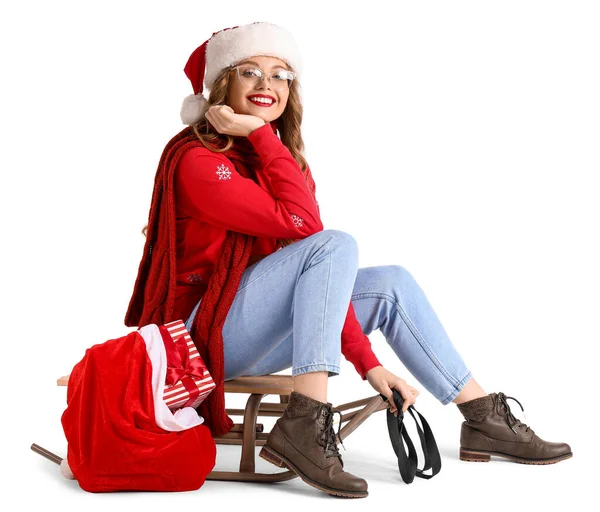 Ung Kvinna Santa Hatt Med Väska Och Släde Sitter Vit — Stockfoto