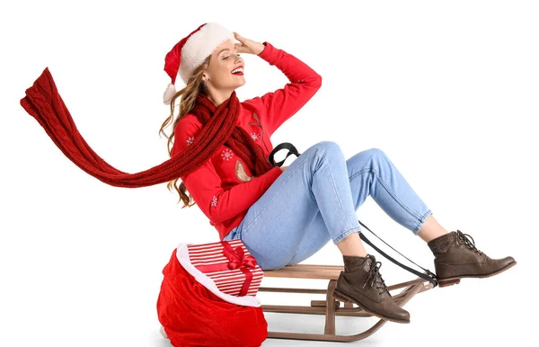 Young Woman Santa Hat Bag Sledge Sitting White Background — Stock Photo, Image