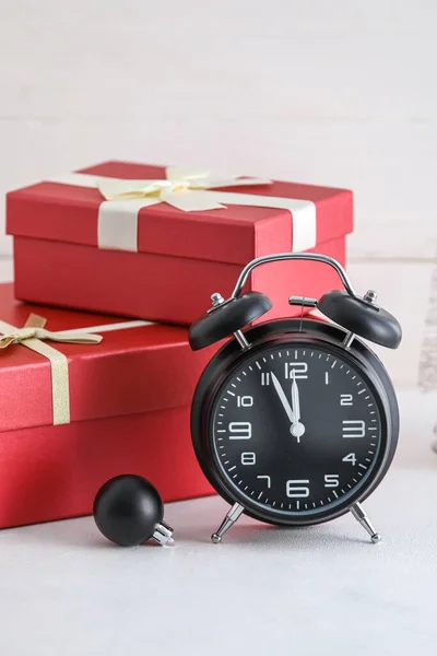 Alarm Clock Christmas Ball Presents White Wooden Background Stock Photo