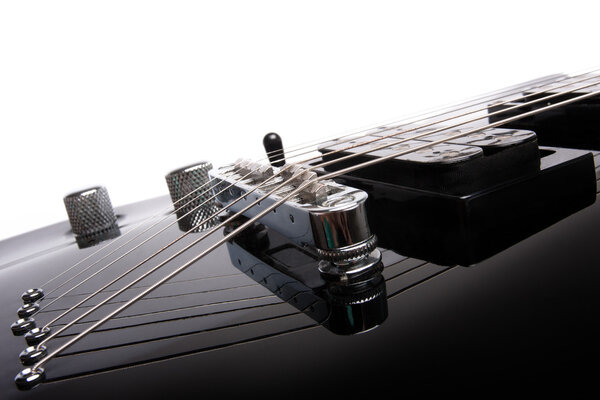 Detail of a black electric guitar