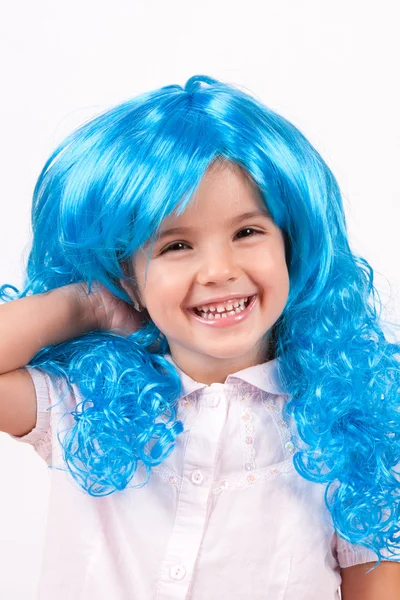 Little girl with blue wigs — Stock Photo, Image