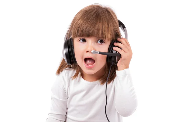 Little girl listening to music — Stock Photo, Image