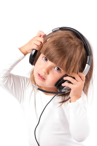 Little girl listening to music — Stock Photo, Image