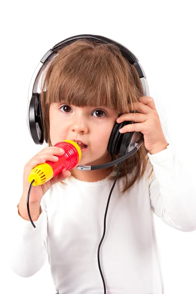 Little girl listening to music — Stock Photo, Image