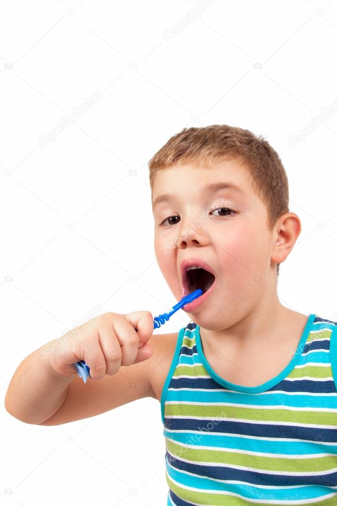 Boy brushing her teeth