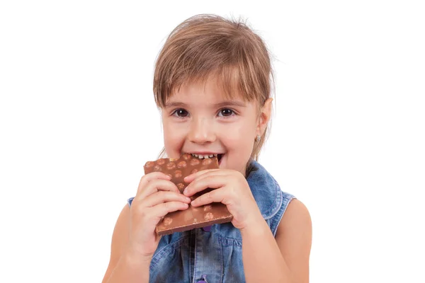 Mädchen essen Schokolade — Stockfoto