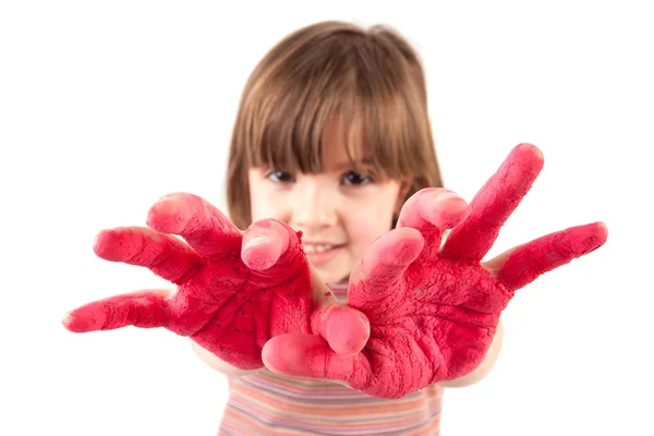 Маленькая девочка с раскрашенными руками — стоковое фото