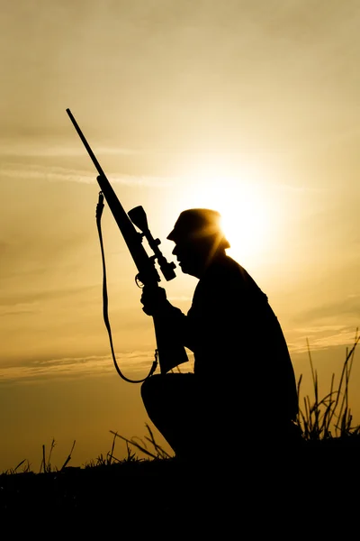 Hunter in the sunset — Stock Photo, Image