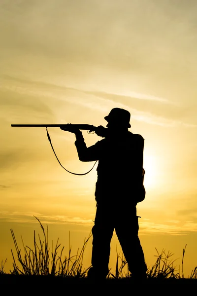 Hunter in the sunset — Stock Photo, Image