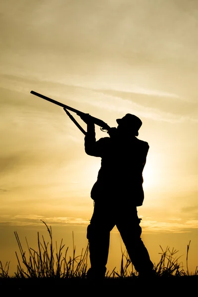 Hunter in the sunset — Stock Photo, Image