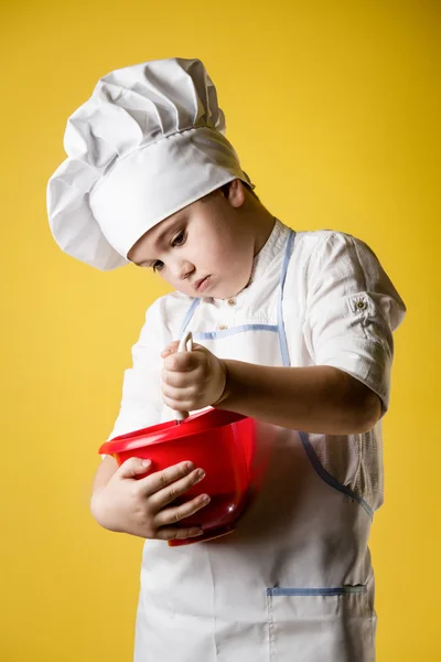 Pequeno menino chef em uniforme — Fotografia de Stock