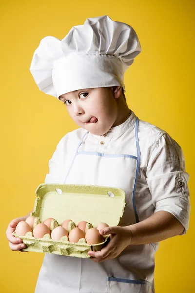 Liten pojke kock i uniform — Stockfoto