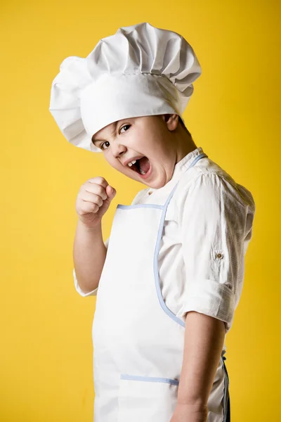 Chef de niño pequeño en uniforme —  Fotos de Stock