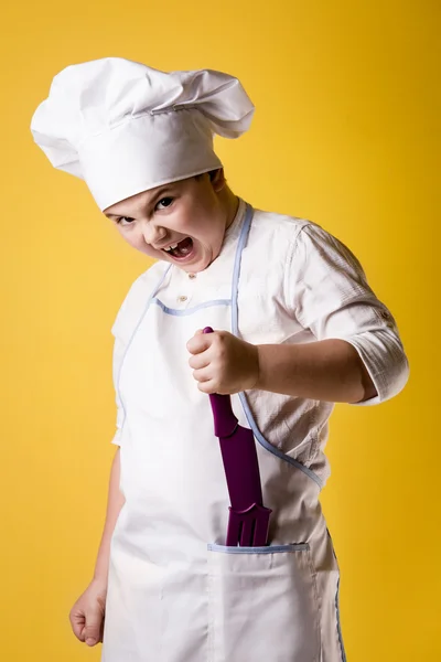 Liten pojke kock i uniform — Stockfoto