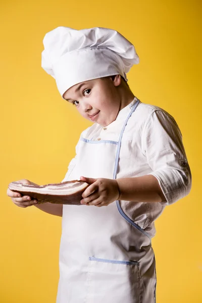 Little boy chef in uniform — Stock Photo, Image