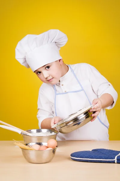 Little boy chef in uniform — Stock Photo, Image