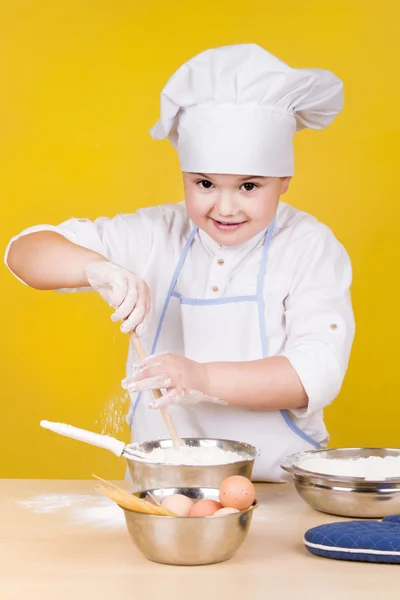 Liten pojke kock i uniform — Stockfoto