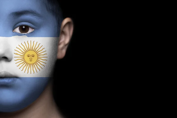 Rostro humano pintado con bandera de Argentina — Foto de Stock