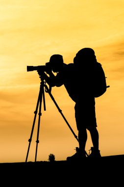 gün doğumu için çekim fotoğrafçı silüeti