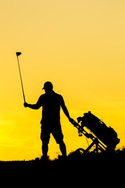 Golf günbatımı siluet