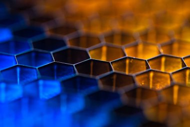 Shiny blue and yellow comb background