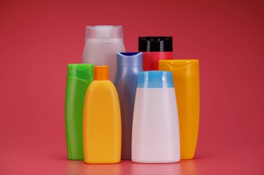 Boş Etiket Şampuan Şişeleri ya da Pembe Arkaplanda Duş Jeli