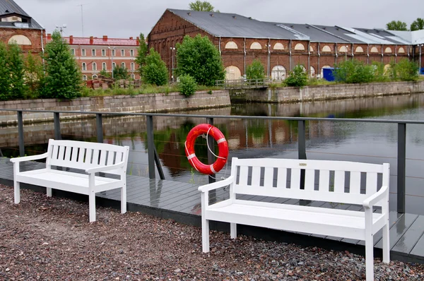 White benches and a lifeline Stock Picture