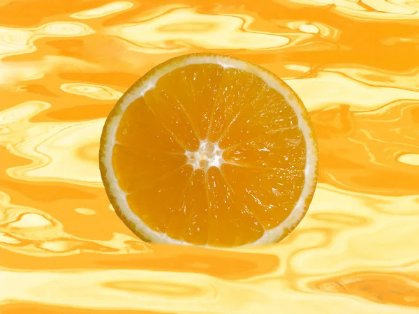 Morceau d'orange dans le jus — Photo