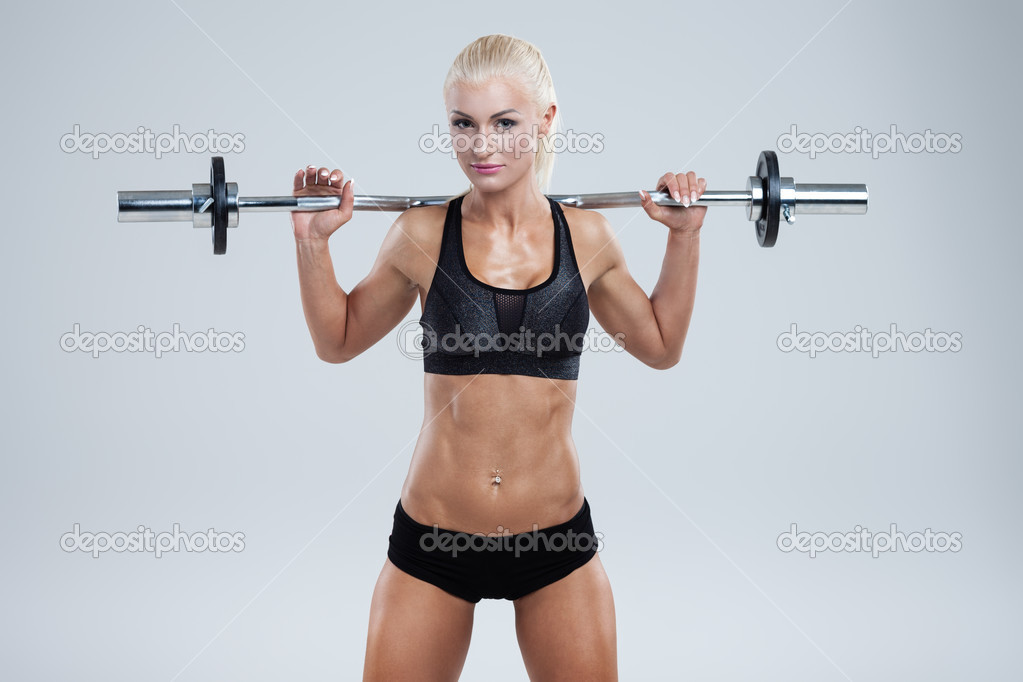 Fitness with barbell — Stock Photo © mtoome 50769323