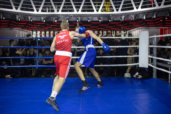 Bout between Togobitsky Ilya and Antonov Alexander in the weight category up to 75 kg during Boxing Kharkiv Derby, located in Victory Concert Hall, Kharkov, Ukraine, 03.12.2021